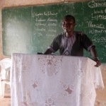Pastor Thomas Asare behind his pulpit
