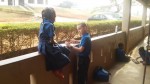 John preaching the Gospel to a classmate