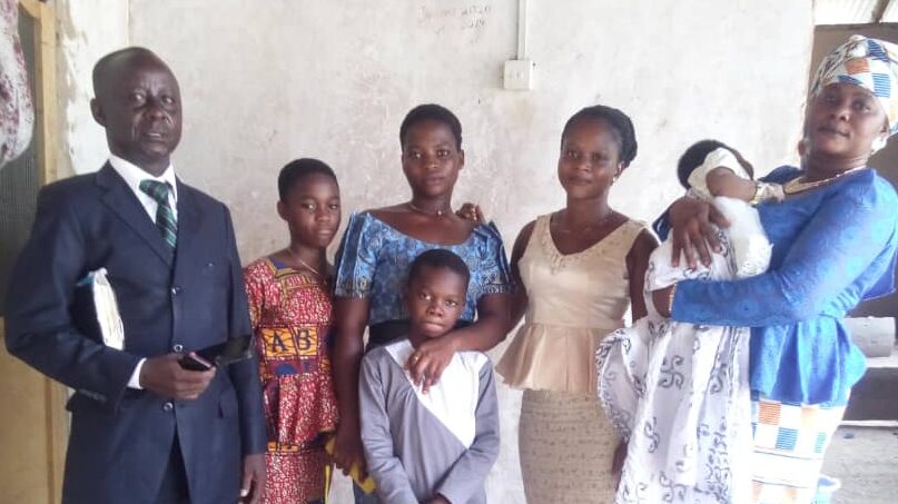 Pastor with converts